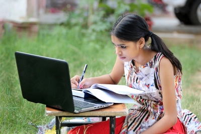 Girl using Internet for school Girl using Internet for school